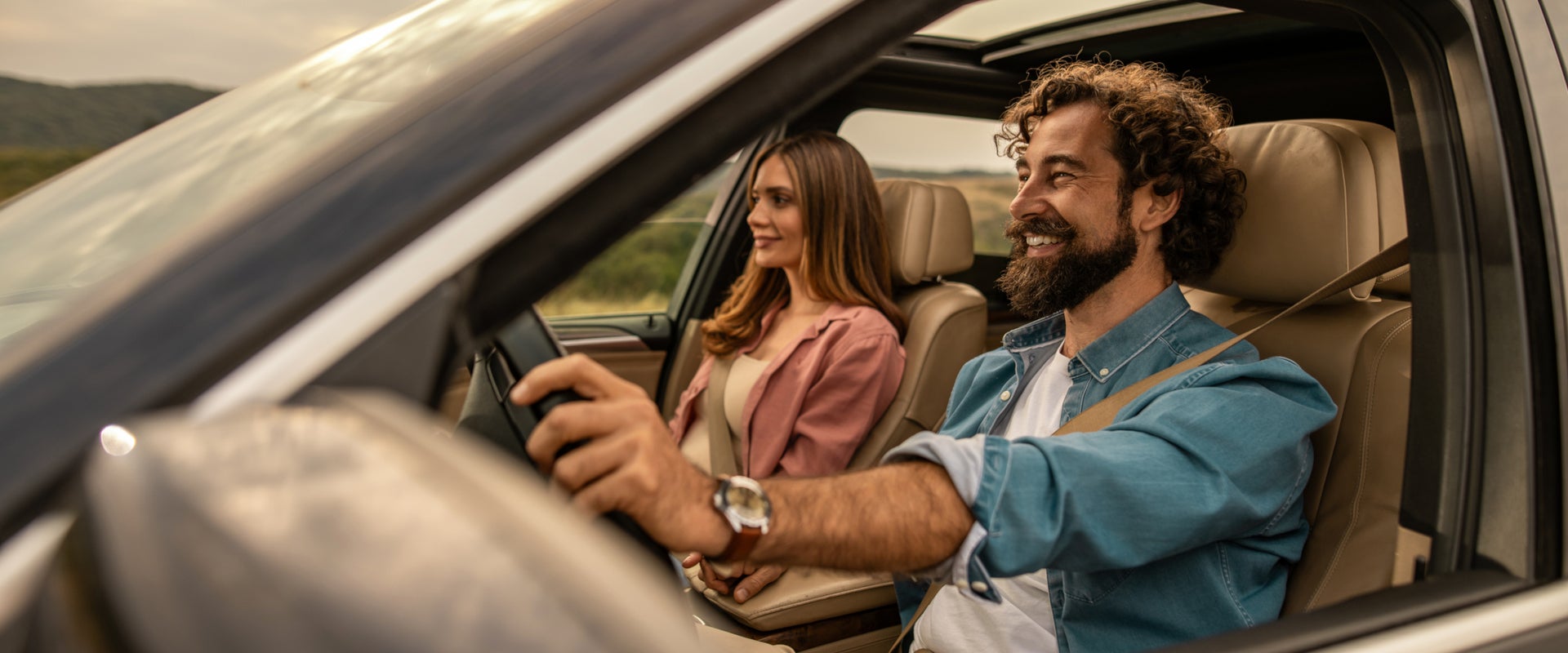 Customers driving away in their new car